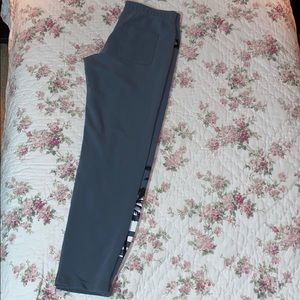 faded blue sweatpants.